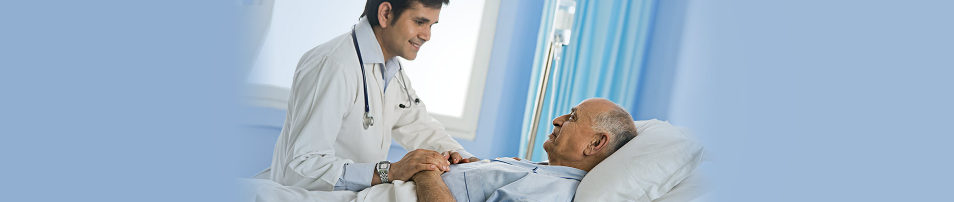 Doctor examines cancer patient to give moral support for recovery